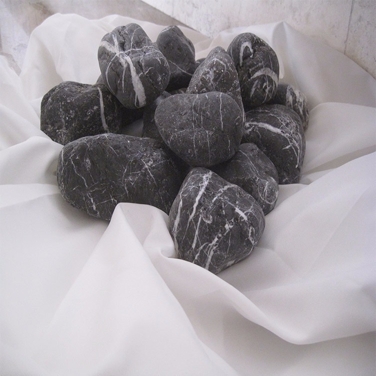 Polished black marble pebbles with white veining