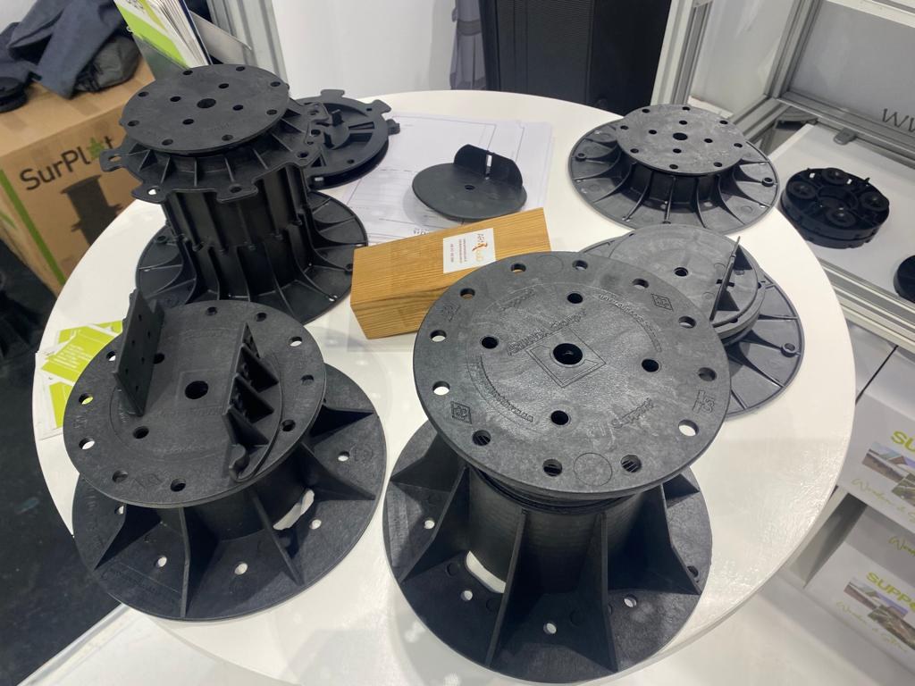 Adjustable pedestal supports used for raised decking