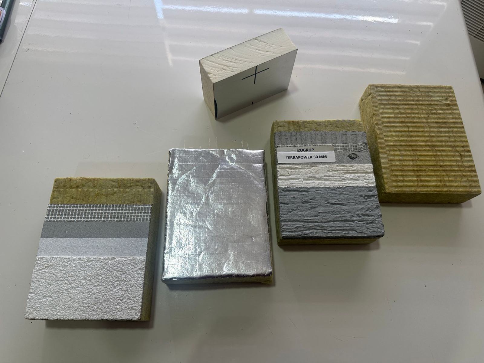 Rock wool and rendered insulation board samples